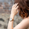 WILD CLOUD ZW10 – Women's olive wood watch in a lifestyle setting