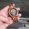 WILD CLIFF CS10 – Men's wooden watch held in hand