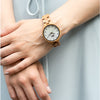 WILD CLOUD ZW10 – Women's olive wood watch, close-up on the wrist